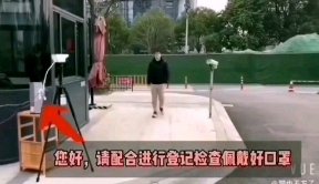 监控摄像机自动识别人员进入是否佩戴口罩。